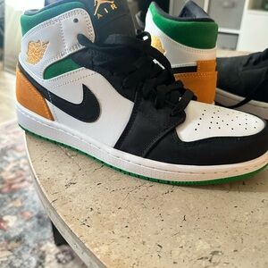 Nike Air Jordan’s  Black, White, Green, and Orange Athletic Shoes men’s size 8.5